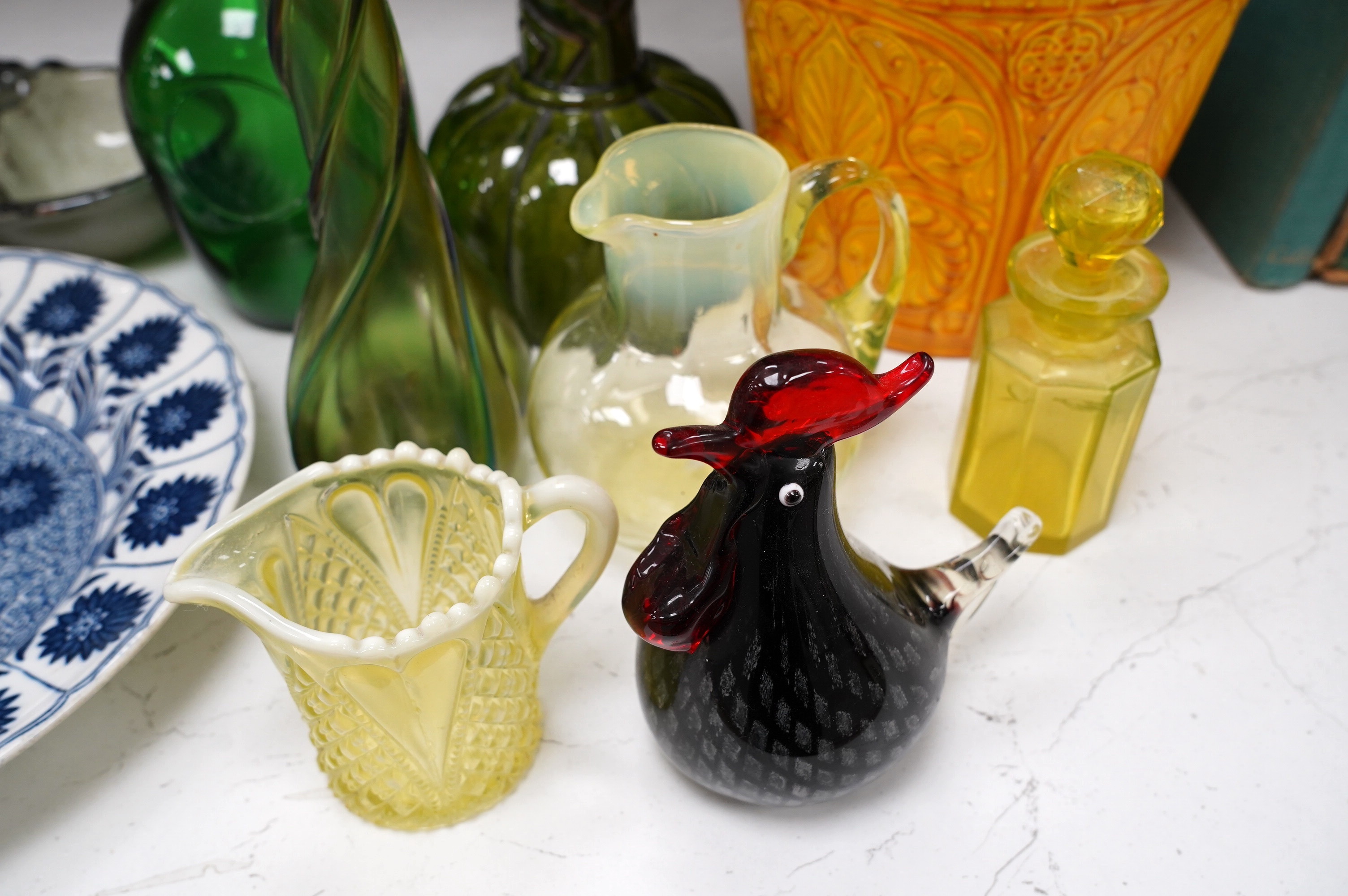 A collection of coloured glassware to include Vaseline examples and a collection of pottery to include a candlestick, a dish and a planter, largest 38cm (10). Condition - mostly fair